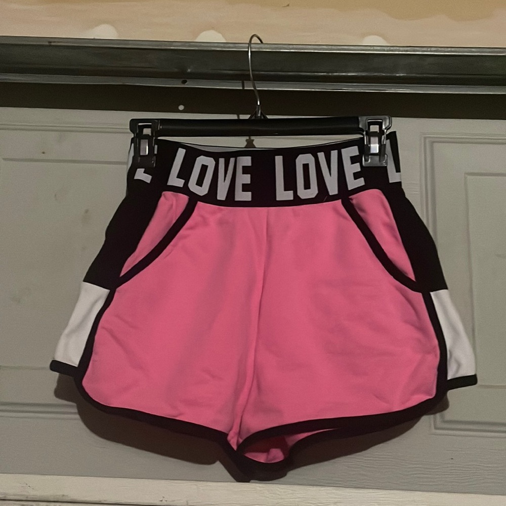 Selling this black and pink shorts